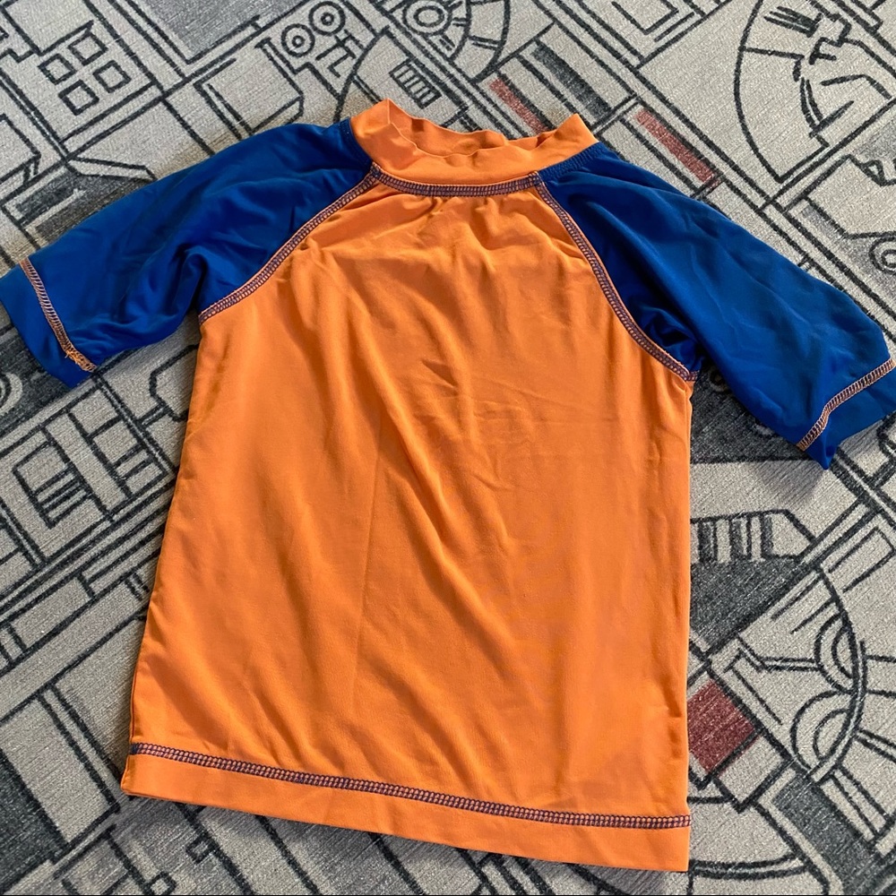 Hartstrings kitestrings rashguard short sleeve swim shirt orange and blue